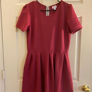 Lularoe dress with zipper in the back and has pockets! Size XL